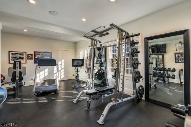 gym featuring a wealth of natural light