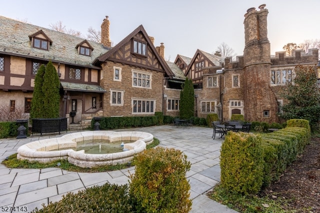 view of community with a patio