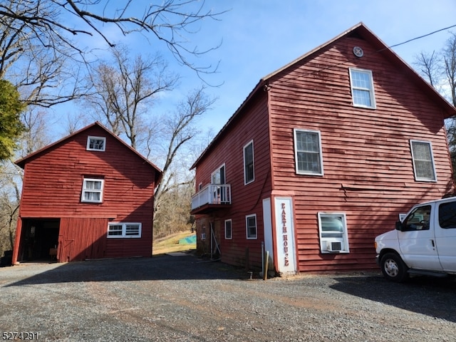 view of property exterior with a balcony