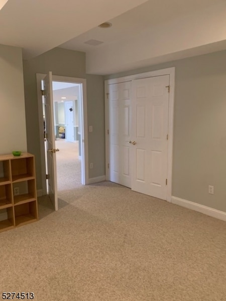 view of carpeted spare room