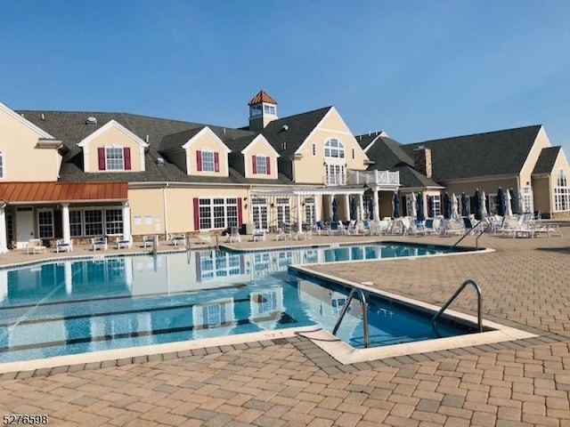 1103 Enclave Cir, Franklin Twp, NJ 08873 - community pool with a patio area