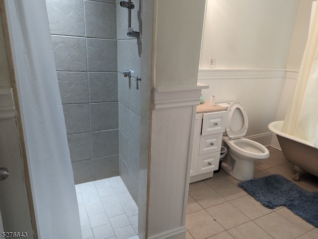 bathroom featuring toilet and tile floors