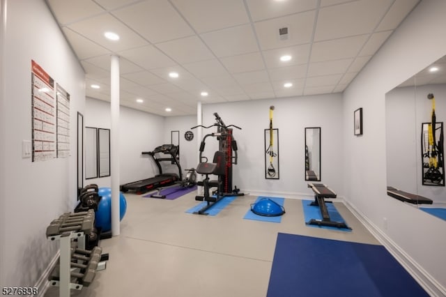 workout room featuring a drop ceiling