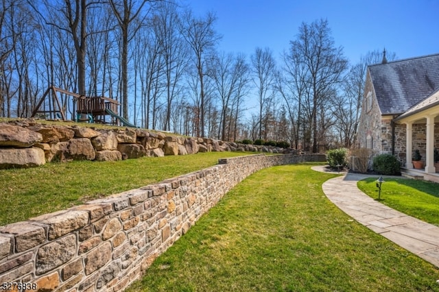 view of yard featuring a playground