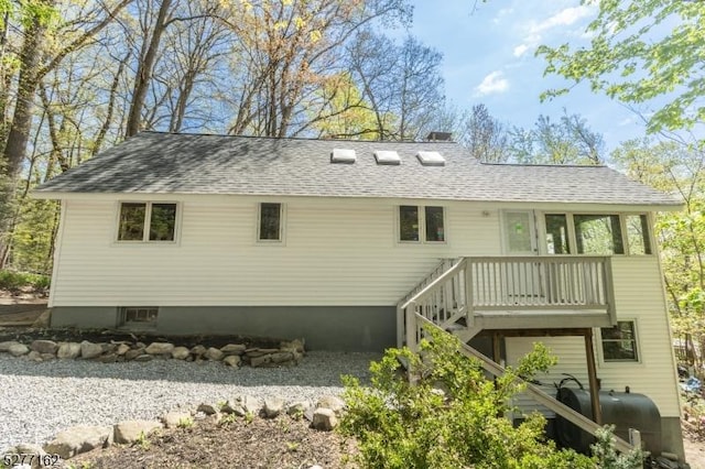 4 Amicalola Dr, Vernon Twp, NJ 07422 - back of property featuring a shingled roof and heating fuel