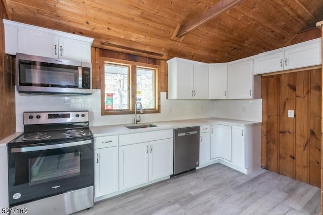 4 Amicalola Dr, Vernon Twp, NJ 07422 - kitchen with stainless steel appliances, wooden ceiling, a sink, light countertops, and white cabinets
