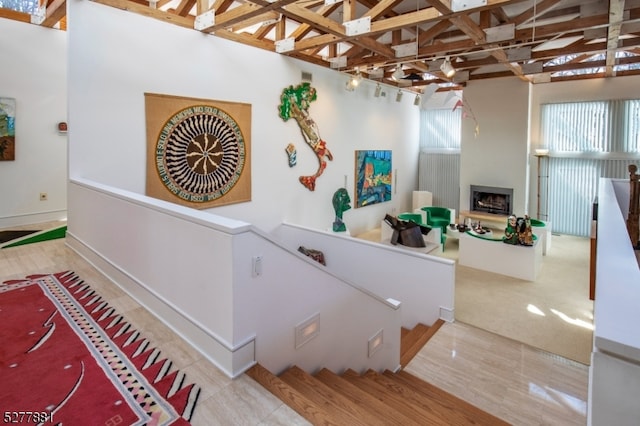 hallway with light hardwood / wood-style flooring