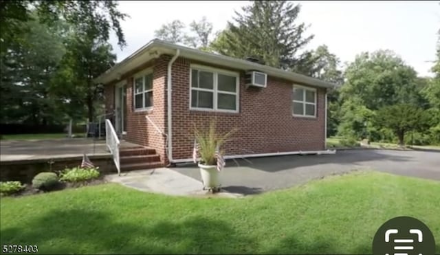 exterior space with a lawn