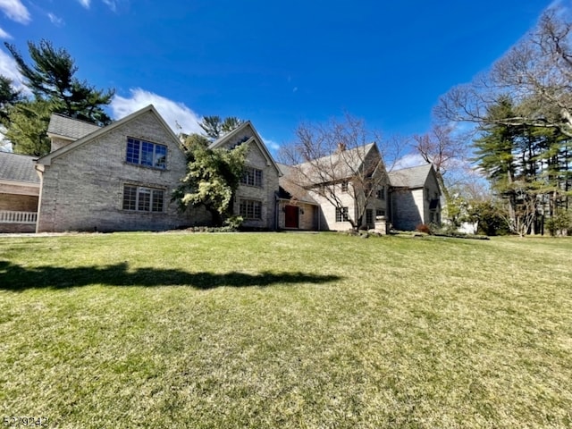 exterior space with a front lawn