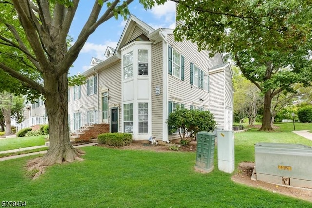 193 Columbus Dr Unit 193, Franklin Twp, NJ 08823 - view of front of home featuring a front lawn