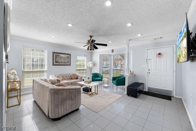 193 Columbus Dr Unit 193, Franklin Twp, NJ 08823 - living area featuring ornamental molding, ceiling fan, baseboards, light tile patterned floors, and a textured ceiling