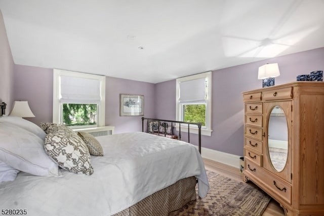 bedroom featuring light wood-type flooring