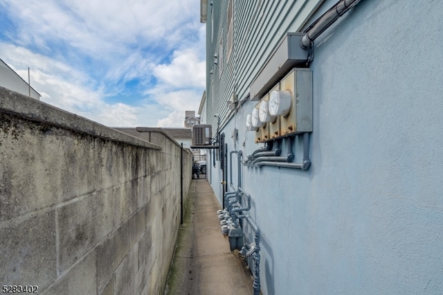 view of home's exterior with central AC unit