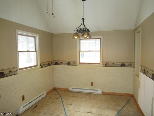 unfurnished dining area with wallpapered walls, vaulted ceiling, and baseboard heating