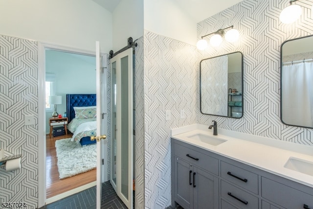 bathroom featuring tile patterned flooring and vanity