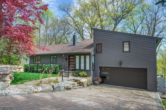 view of front of home featuring a garage