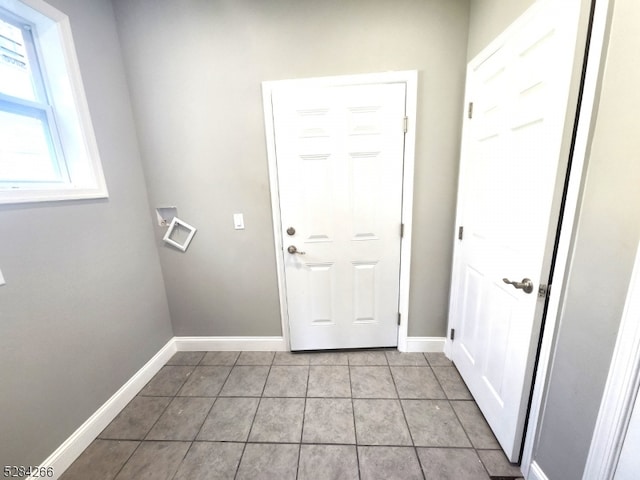 entryway featuring light tile patterned floors