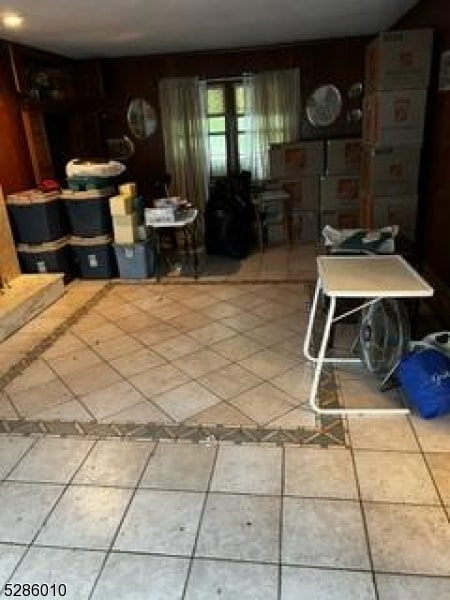 dining space with tile floors