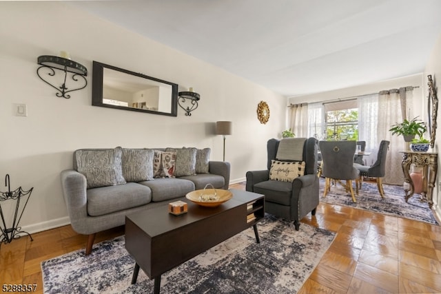 living room featuring parquet floors