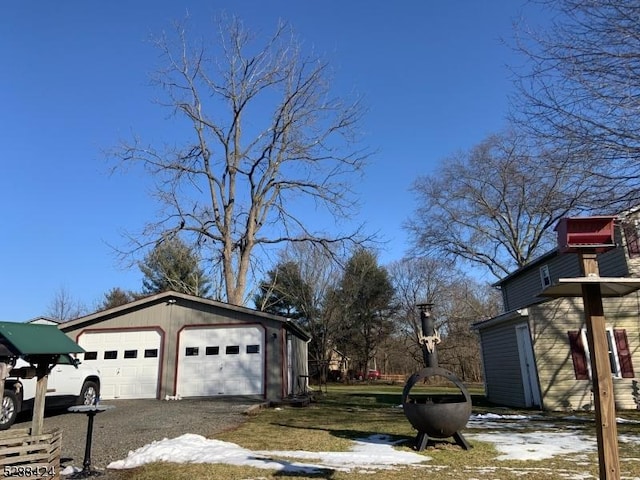 view of home's exterior with an outbuilding and a garage