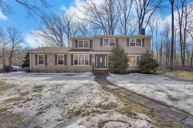 view of front of property with a chimney