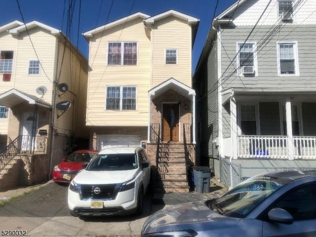 view of front facade with an attached garage and driveway