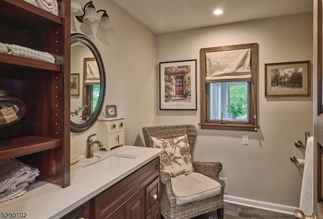 bathroom featuring tile flooring and vanity