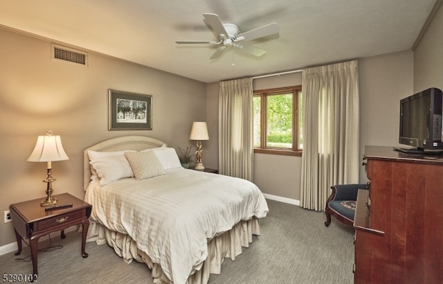 bedroom featuring ceiling fan and carpet floors