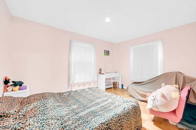 bedroom featuring hardwood / wood-style floors