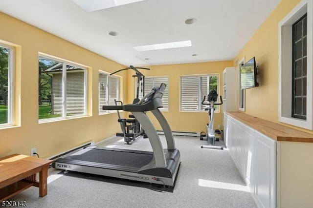 268 Stonehouse Rd, Bernards Twp, NJ 07920 - exercise area featuring a skylight, plenty of natural light, light colored carpet, and recessed lighting