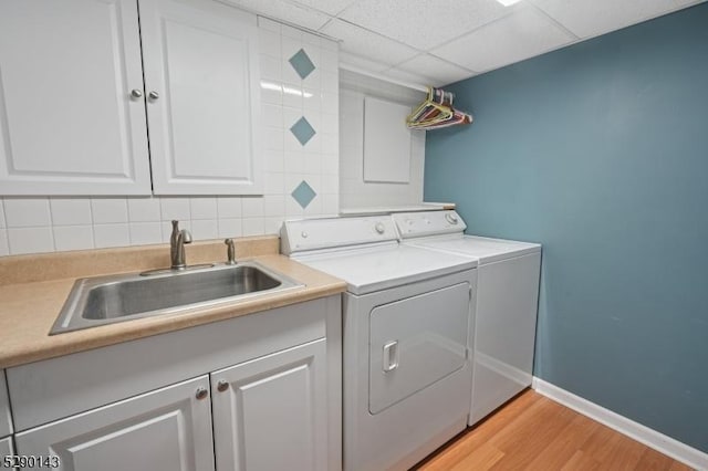 268 Stonehouse Rd, Bernards Twp, NJ 07920 - washroom featuring washing machine and dryer, cabinet space, and light wood finished floors