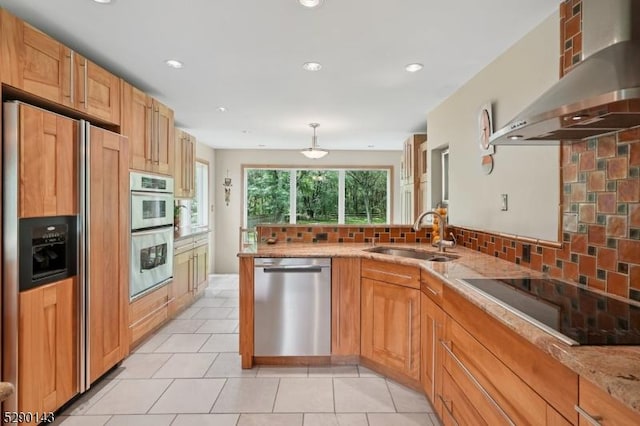 268 Stonehouse Rd, Bernards Twp, NJ 07920 - kitchen with stainless steel appliances, wall chimney range hood, decorative backsplash, light stone countertops, and a peninsula