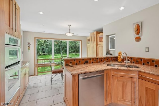 268 Stonehouse Rd, Bernards Twp, NJ 07920 - kitchen featuring appliances with stainless steel finishes, light stone countertops, backsplash, light tile patterned floors, and pendant lighting
