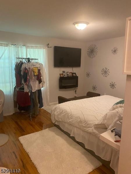 bedroom featuring hardwood / wood-style floors