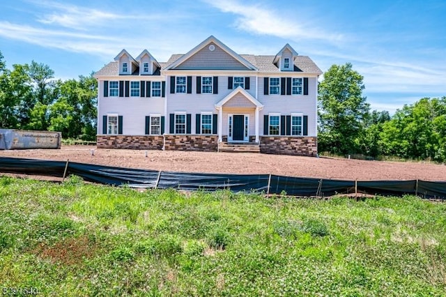 view of front facade featuring stone siding