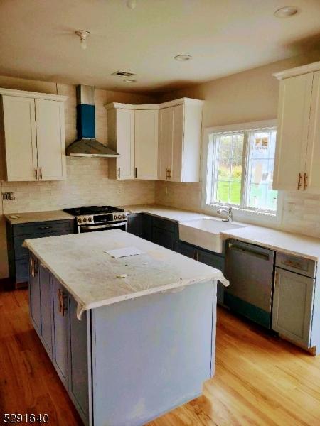 interior space with crown molding and hardwood / wood-style flooring