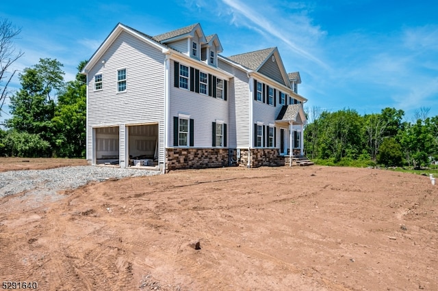 view of property exterior featuring a garage