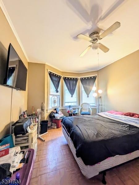 bedroom featuring parquet floors and ceiling fan