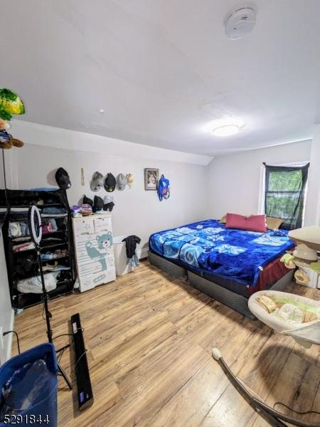 bedroom featuring hardwood / wood-style flooring