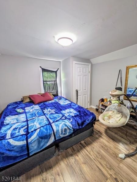 bedroom featuring hardwood / wood-style flooring