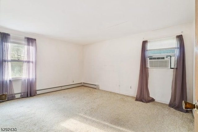 spare room featuring cooling unit and carpet floors