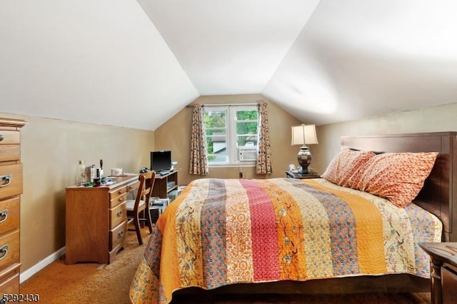 bedroom with light carpet and vaulted ceiling