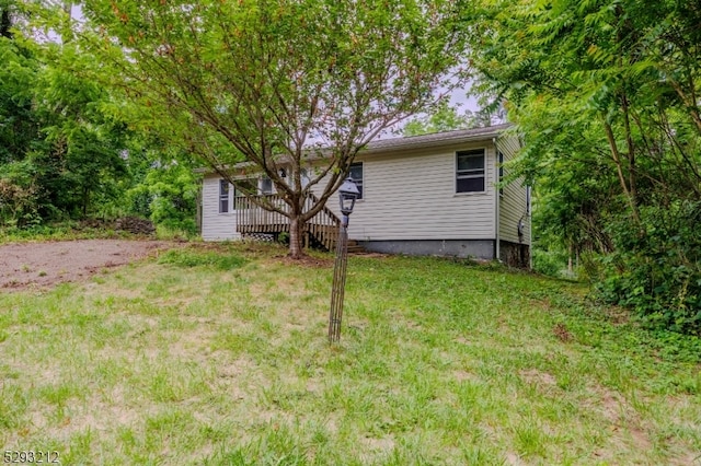 view of yard featuring a deck