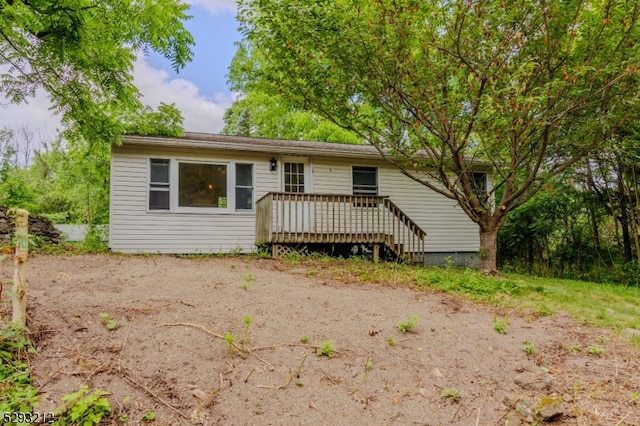 view of front of property with a deck