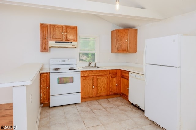 kitchen featuring sink, vaulted ceiling, and white appliances