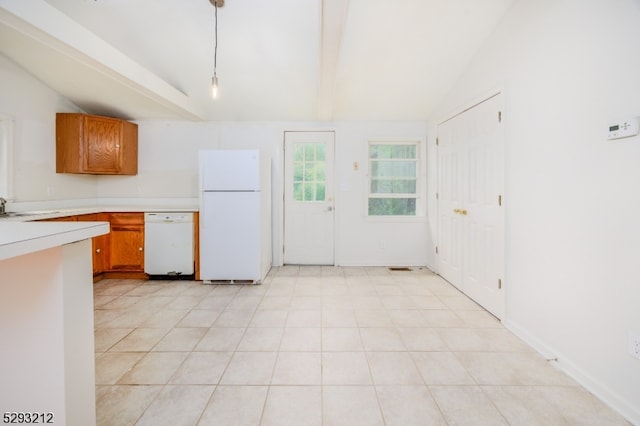 kitchen with sink, lofted ceiling with beams, white appliances, and light tile patterned floors