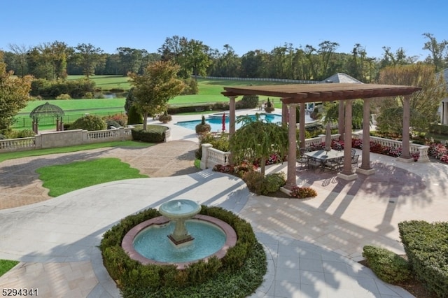 view of home's community with a pergola