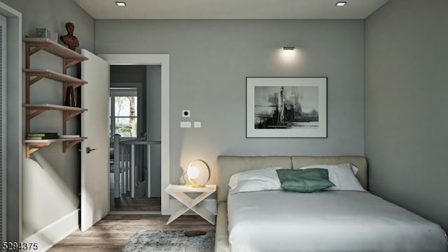 bedroom featuring wood-type flooring