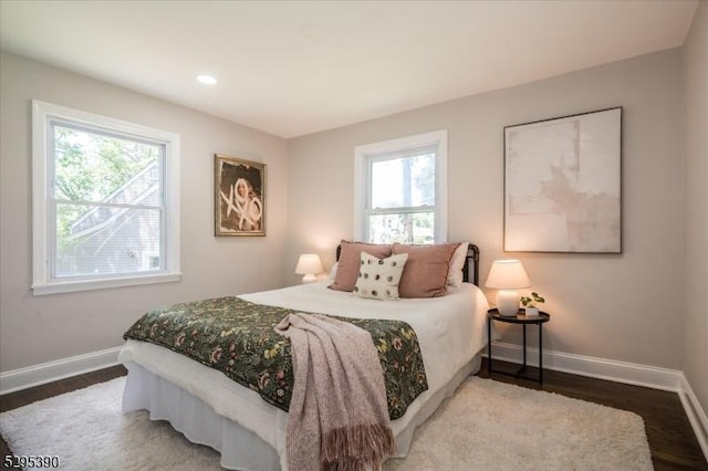 bedroom with wood-type flooring