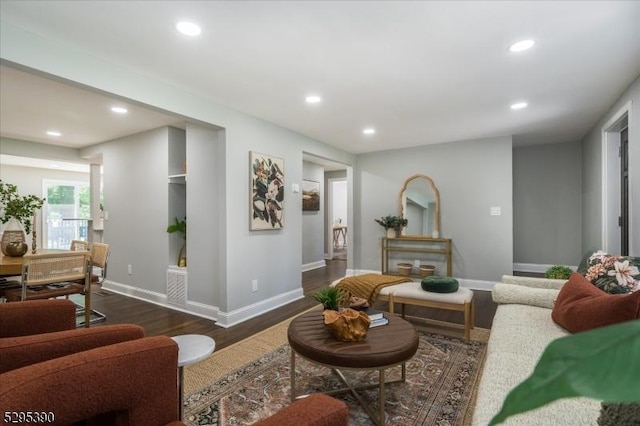 living room featuring dark hardwood / wood-style floors